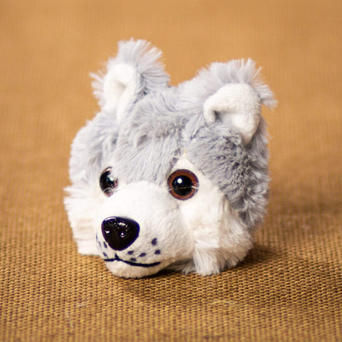 Free plush sewing pattern: Cat, dog, fox, wolf laying stuffed animals