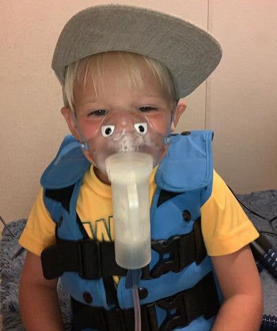 Tanner going through one of his daily treatment sessions to combat Cystic Fibrosis.