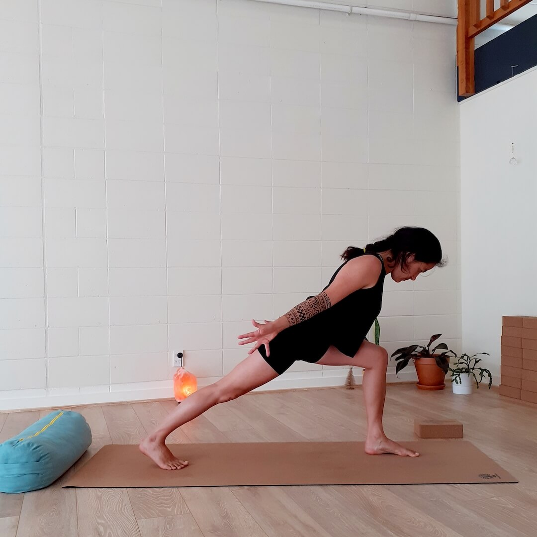 Charlotte Genton warrior pose on cork yoga mat