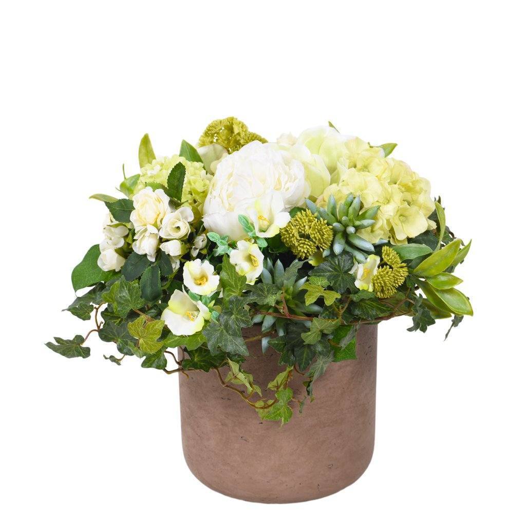 small artificial flowers in vase