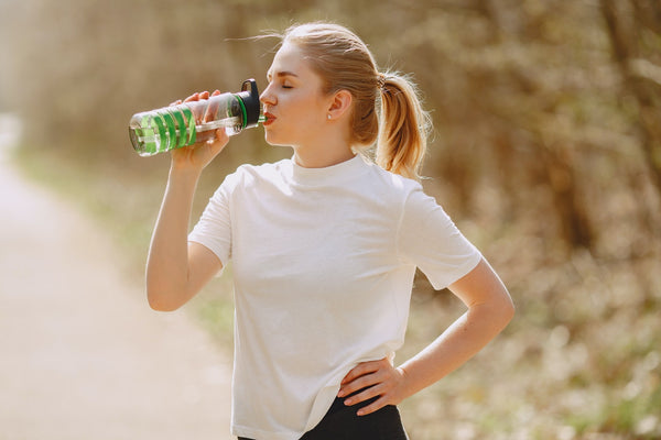 A woman drinks water