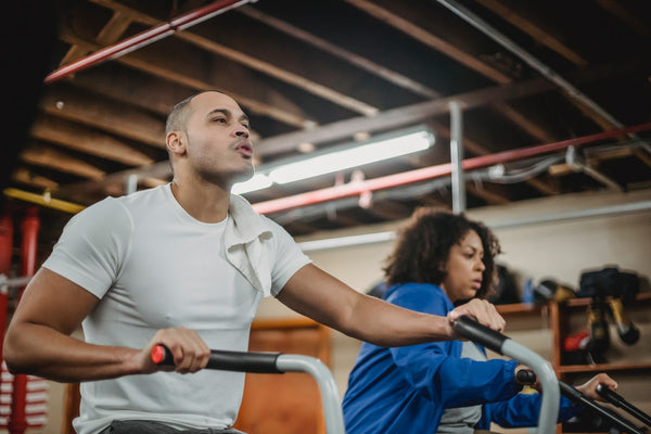 Man and woman doing cardio exericse