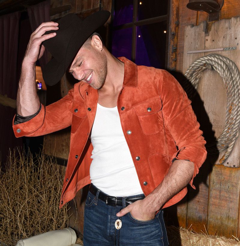 Matthew Noszka in mens felt black cowboy hat at the Tom Ford Beauty Ombré Leather Parfum launch party in West Hollywood, California.