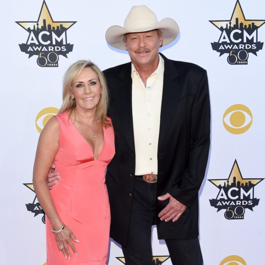 Jackson and his wife attend the 50th ACM awards in Texas. His white hat stays within his preferred color, but the crown and brim shaping is slightly different than his other hats. (Jason Merrit/Getty Images)