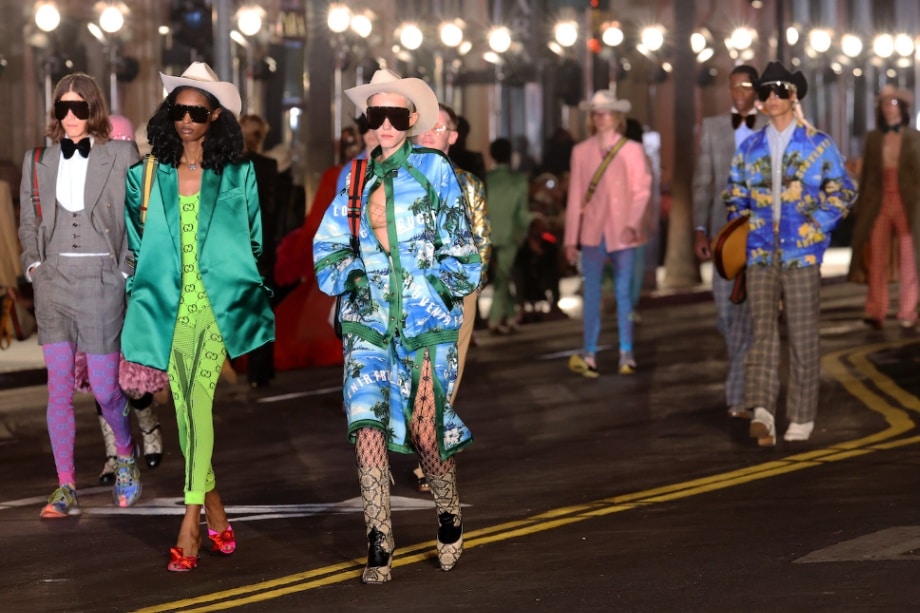 A parade of Gucci models stunned the live crowd with their colorful cowboy hats and stellar outfit.