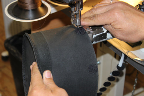 image of velcro being sewn onto hat crown