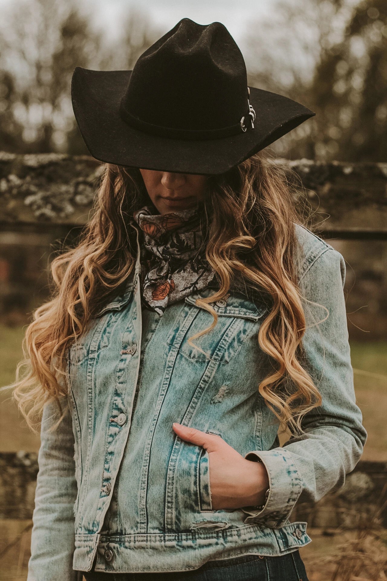 Image on girl in jean jacket wearing an American Hat Makers felt Cattleman hat in color black