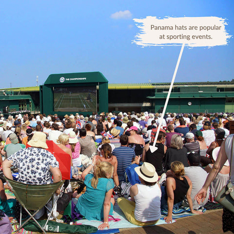 Person in a crowd wearing a Panama Hat