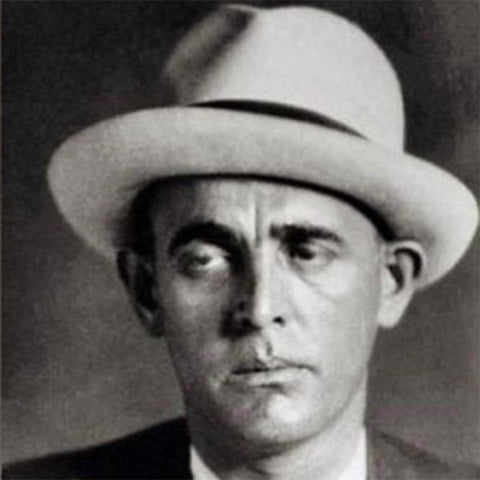 Mugshot of gangster wearing a fedora hat