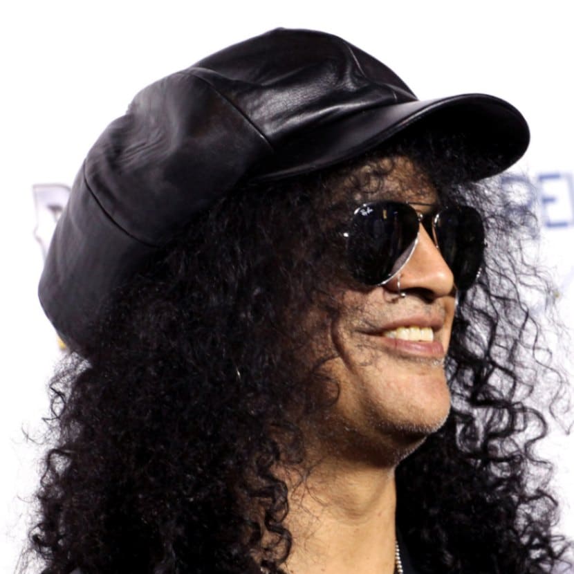 Slash wears a black leather flat cap at the BandFuse: Rock Legends event at the House of Blues
