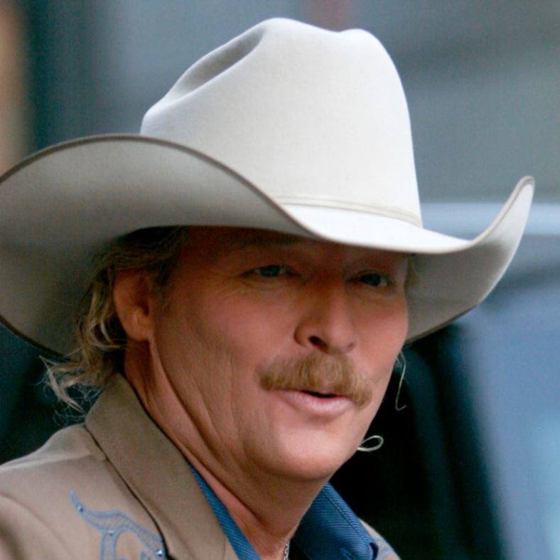 Jackson pairs a traditionally styled silver belly hat with an embroidered jacket for a visit to New York City. The bound edge completes the dressed-up look. (Brian Ach/WireImage)