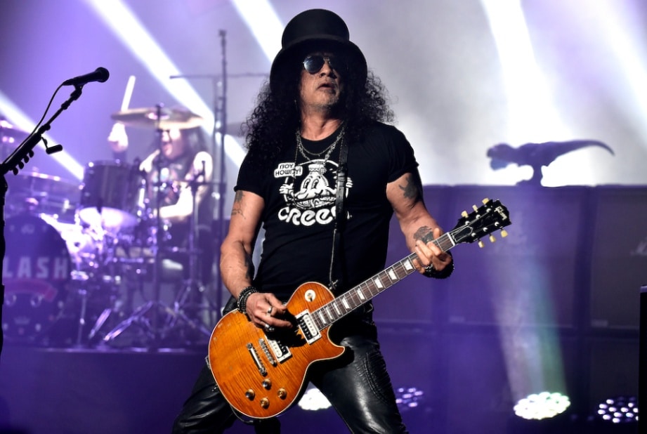 Slash and his top hat perform at the River is Rising Tour
