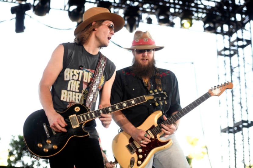 The band Whiskey Myers plays at Stagecoach, with both guitarists wearing felt cowboy hats