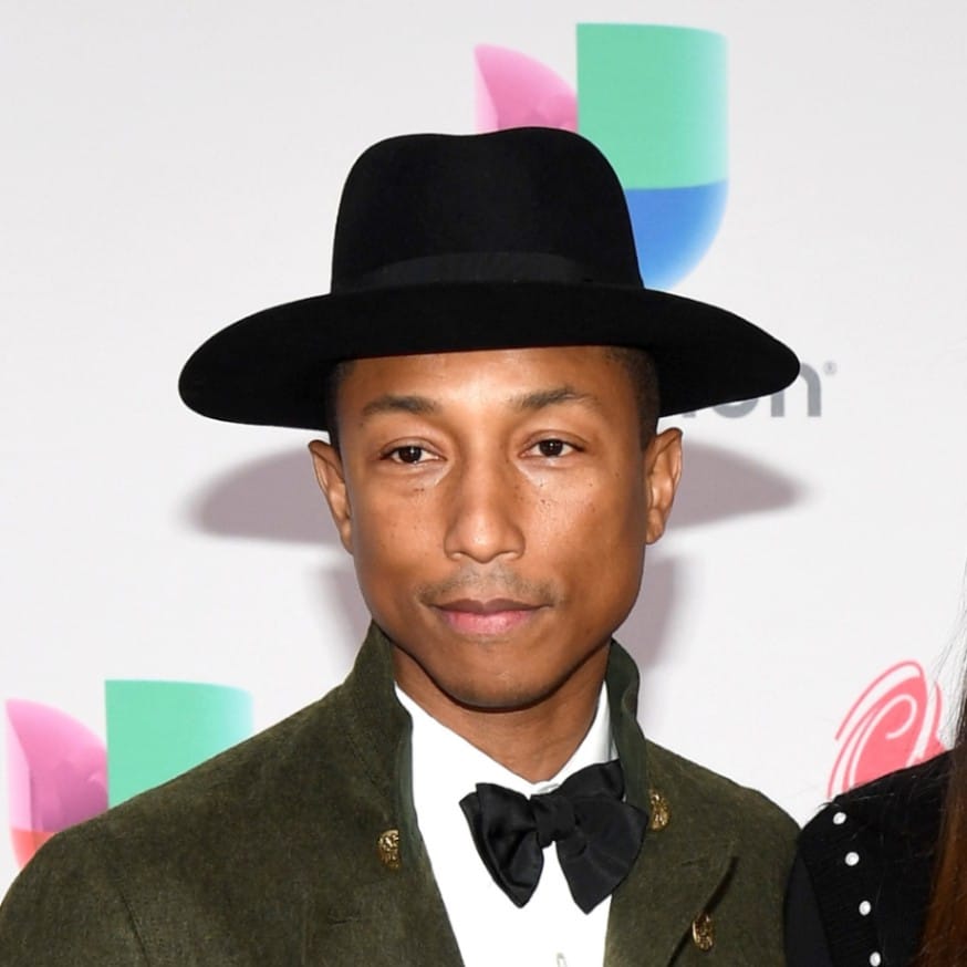 Pharrell Williams wears a black fedora at the Latin Grammy Awards