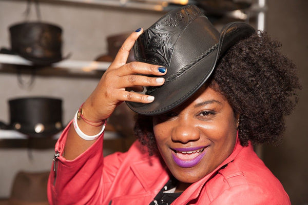 Adrienne c moore wearing her falcon cowboy hat