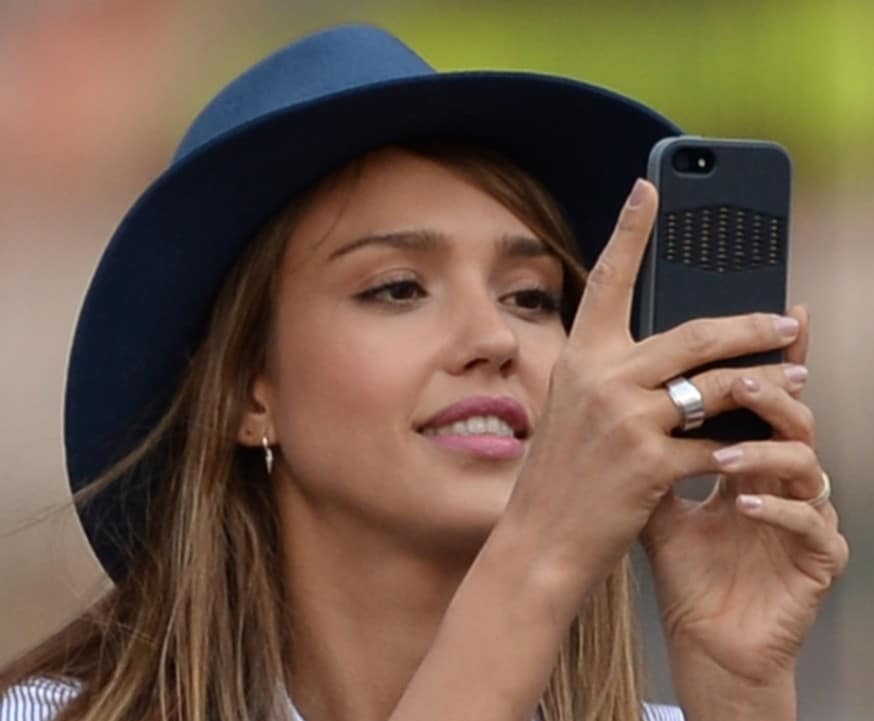 Huge sports fan-Jessica Alba attends the 2013 US Open at USTA Billie Jean King National Tennis Center on September 9, 2013, in New York City. She is seen sporting a floppy hat which is perfect for the outdoor game.