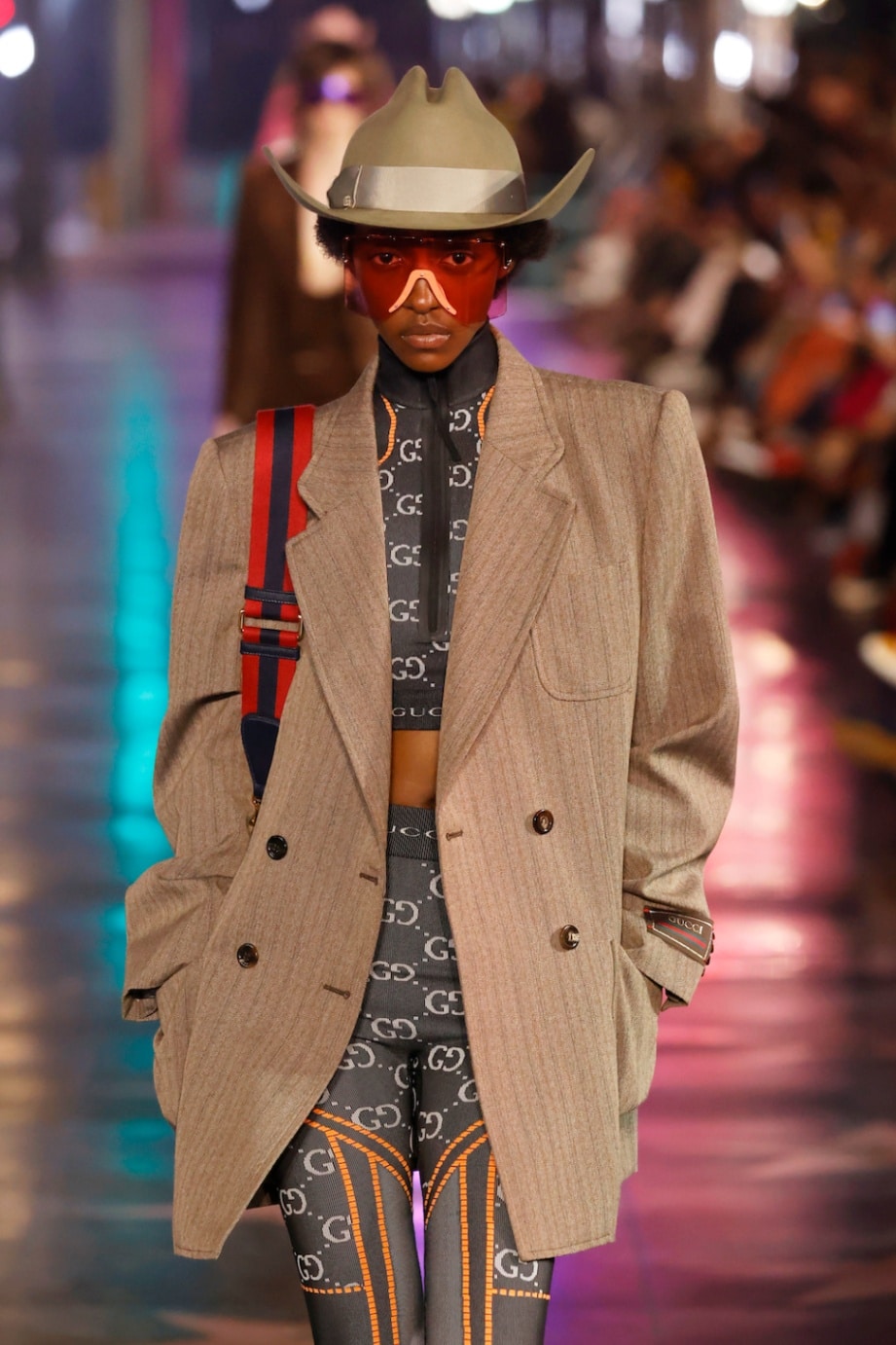 A warm tan Gucci cowboy hat with metallic silver band on top of an all-Gucci fit was modeled at the show.