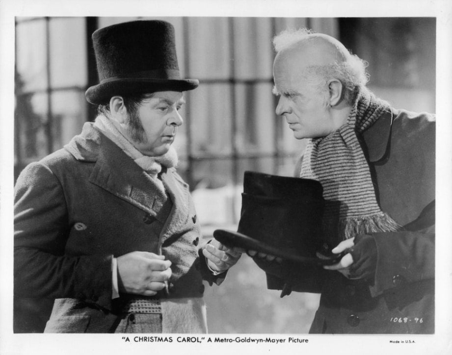 Gene Lockhart and Reginald Owen with top hats in A Christmas Carol