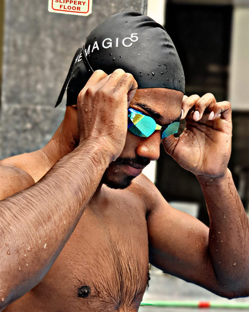Swimmer wearing THEMAGIC5 Goggles