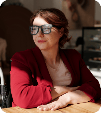 A woman wearing glasses.