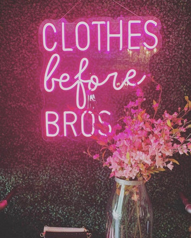 clothes before bros neon sign boutique