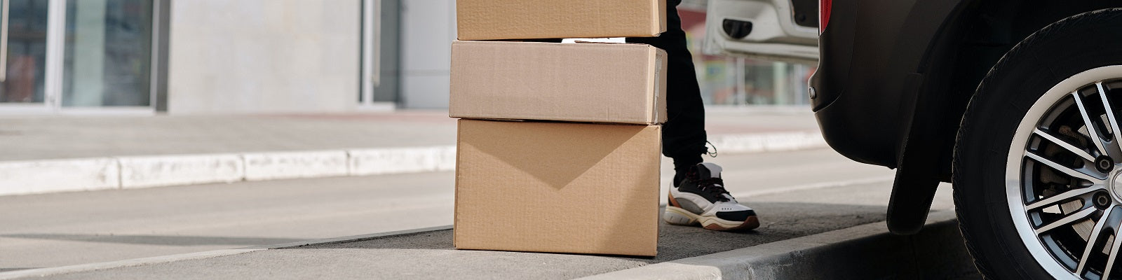 Packages being loaded into a van