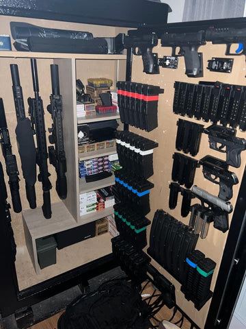 Vertical gun rack in safe