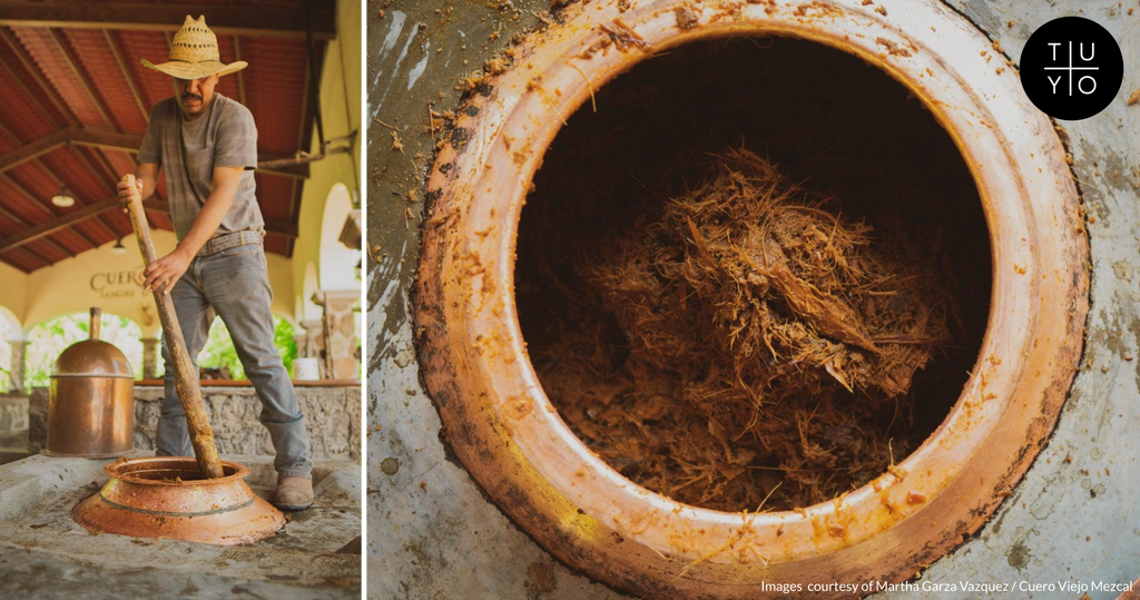  Filling the copper alembique with the mosto (fermented agave mash) at the Cuero Viejo Taverna in Durango.