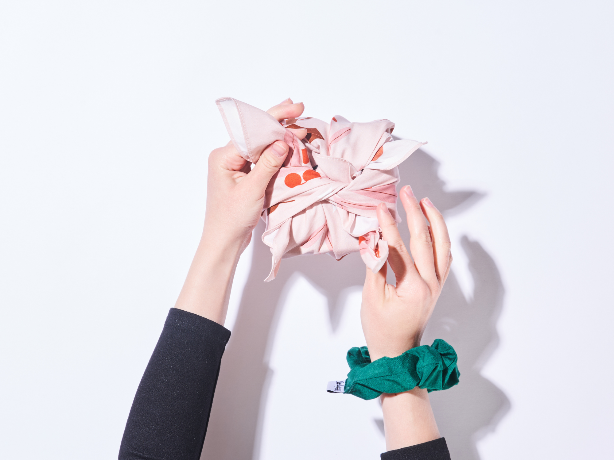 tie a single knot with the remaining corners of the furoshiki