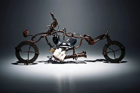 Recycled metal used to create a bike collectible.