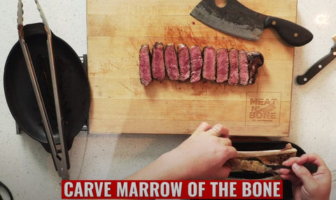 topping the steak with bone marrow