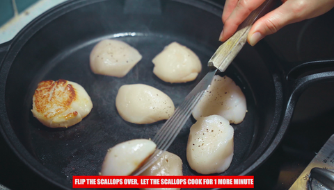 turning scallops over