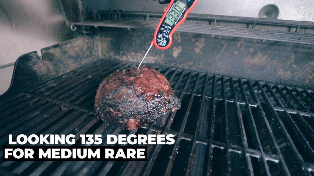 meat thermometer in steak