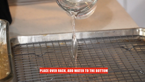 adding water to the tray