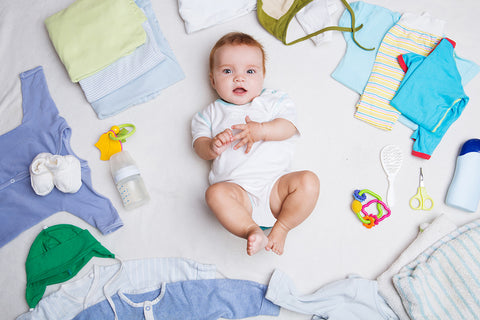 baby's 1st wardrobe with onesies, socks, bodysuits, rompers, footies and beanies