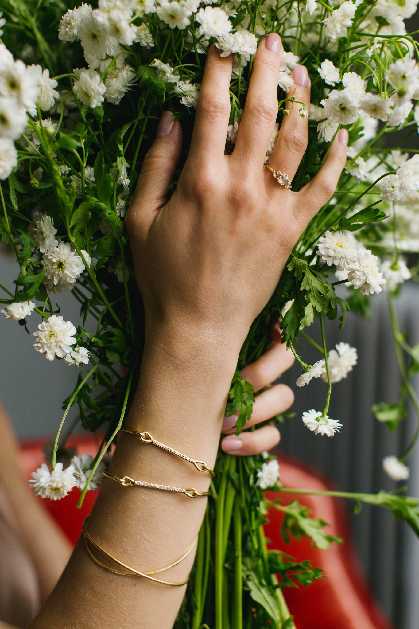 Needle eye cuffs and bangles with daisies.