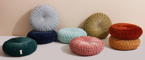 Round velvet pillows