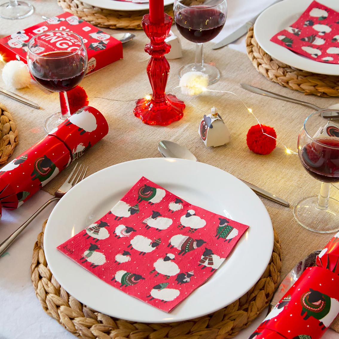 Christmas Wooly Sheep Decorations With Red Napkin Featuring Little Sheep Characters - Talkig Tables UK