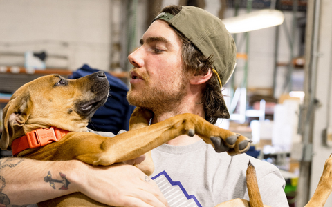 person holding a dog