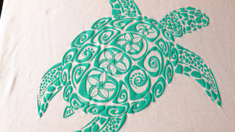 A turquoise turtle printed with puff ink