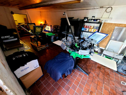 a screen printing shop with two presses in it