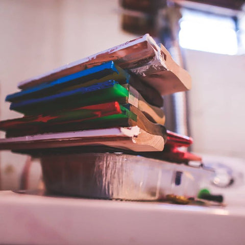 squeegees with ink on the blades