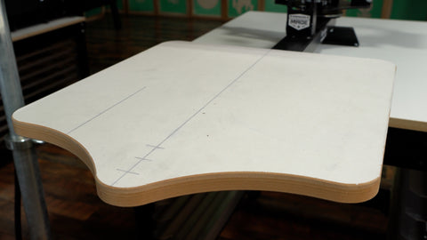 a platen with freshly applied tape and platen lines