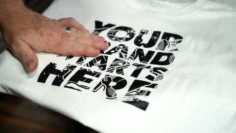 a white shirt printed with black water based ink that reads "your brand starts here"