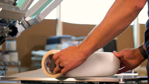 a printer applies platen tape to a platen