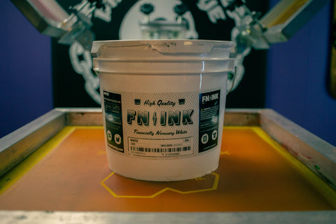 a bucket of Fn Ink sits on a screen