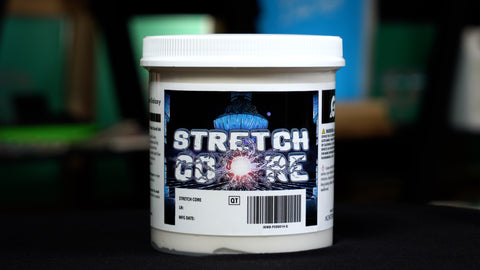 A bucket of Stretch Core sits on a table