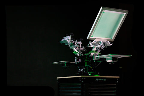 A screen sits in the upright position on a riley hopkins 150 press
