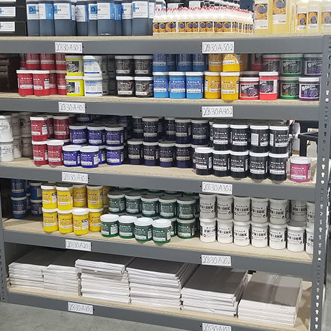 Warehouse shelves stocked full of ink