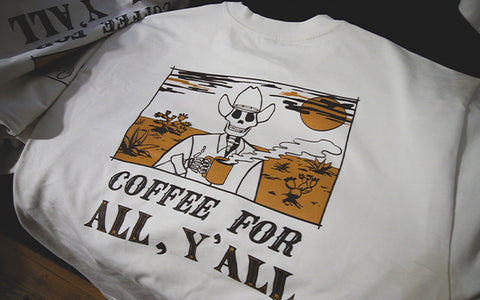 Printed t-shirt that says "coffee for all y'all"